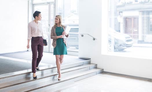 People walking in a residential building