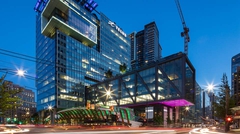 Exterior of Telus multi-story commercial office building at night