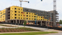 Exterior of multi-story dorm construction of Versa-Dek on steel stud