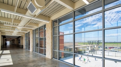 Acoustical deck in hallway of school window overlooking playground