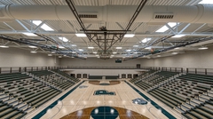 Overlooking basketball court steel joist and deck ceiling with HVAC duct work