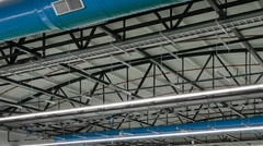 Close-up of MEP integration with bowstring joist girders