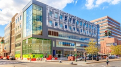 Corner street view of multi-story retail building