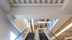 Escalators in multi-story retail building